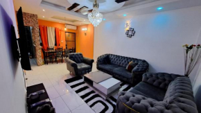Residence GermanoTech Bonamoussadi,Logbessou appartement meublé 2ch,1salon eau chaude,Wifi,parking,virgile,menagere,canalsat